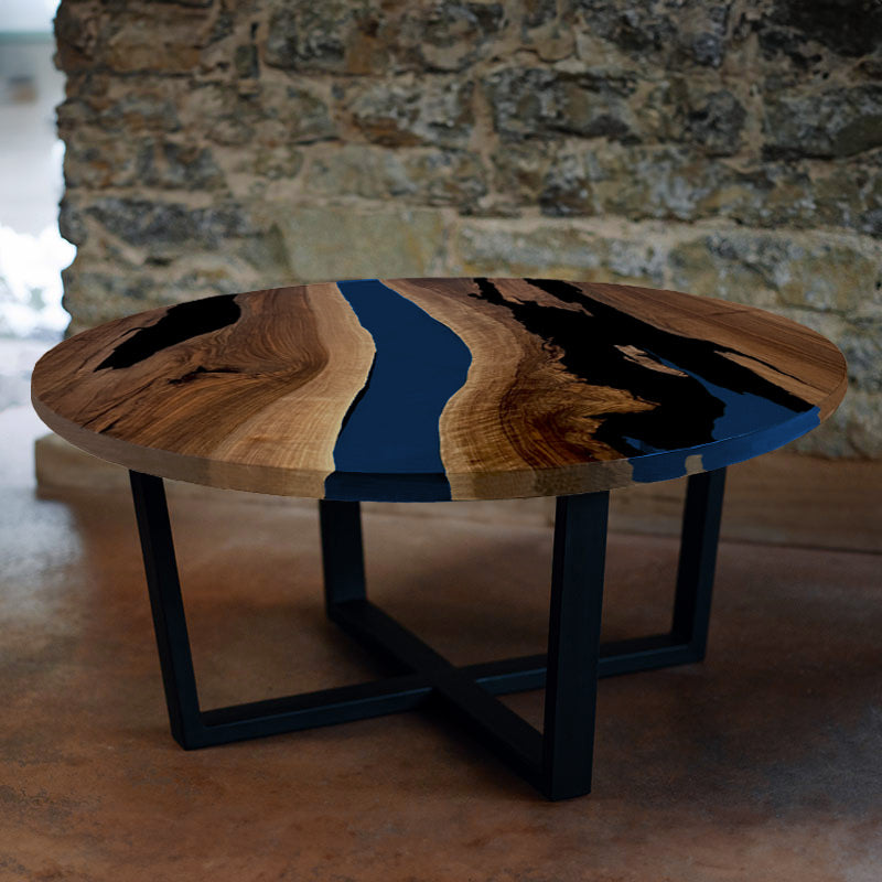 Couchtisch Nussbaum rund mit Epoxidharz maritim blau. Modell Gletschersee