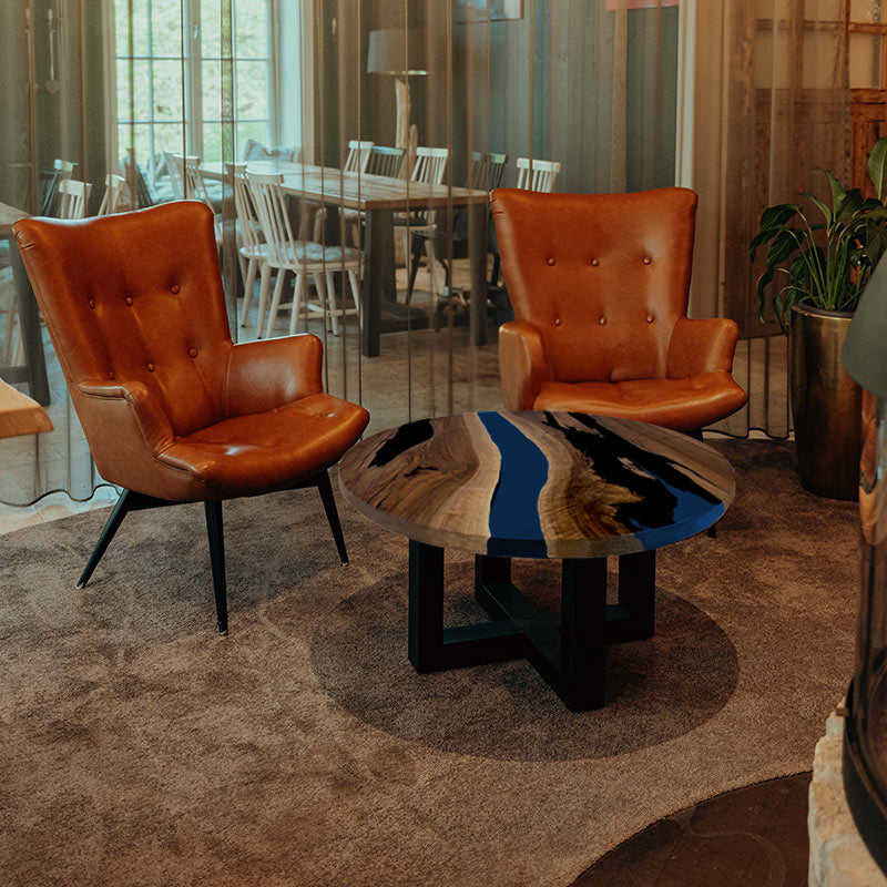 Couchtisch Nussbaum rund mit Epoxidharz maritim blau. Modell Gletschersee