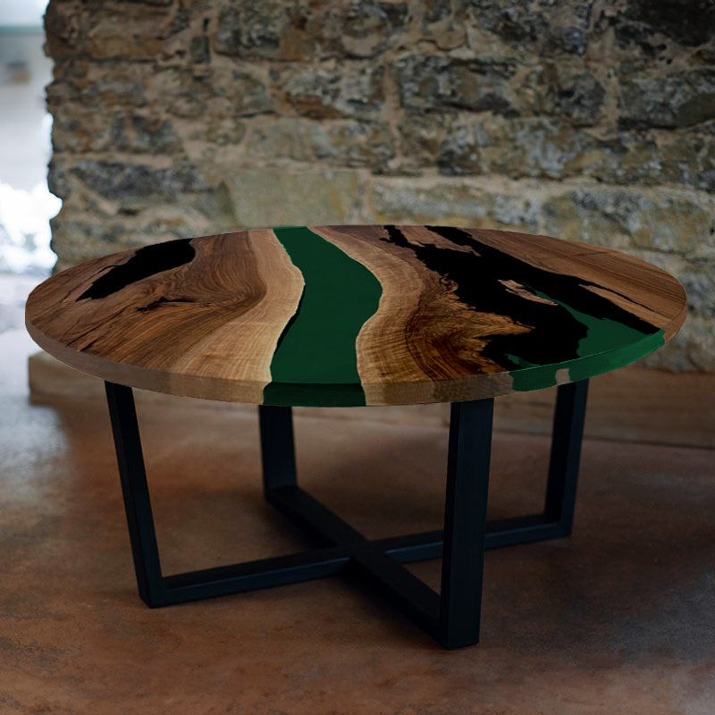 Couchtisch Nussbaum rund mit Epoxidharz smaragd-grün. Modell Gletschersee