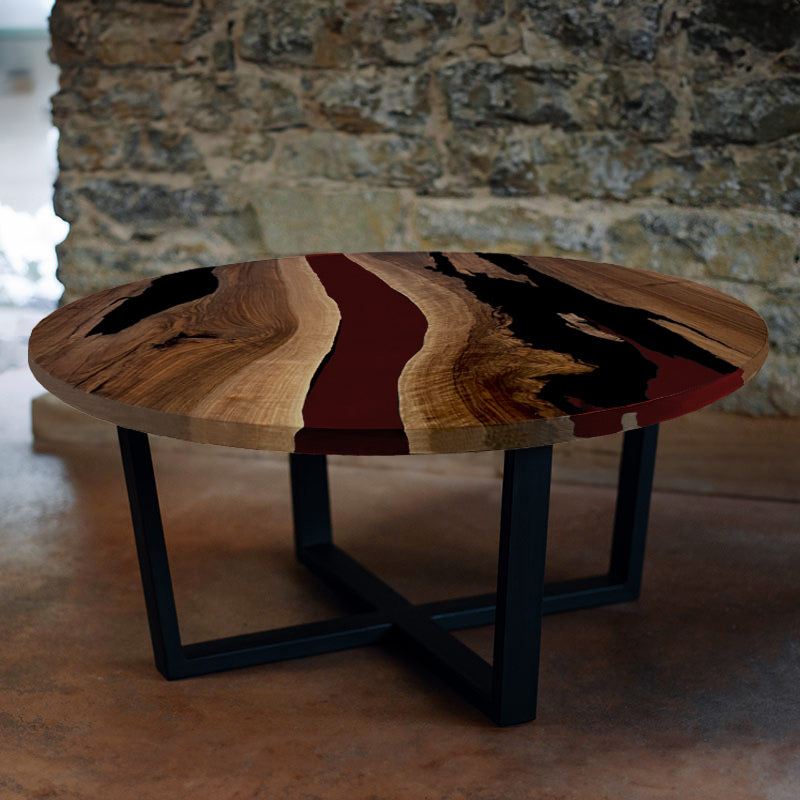 Couchtisch Nussbaum rund mit Epoxidharz weinrot. Modell Gletschersee