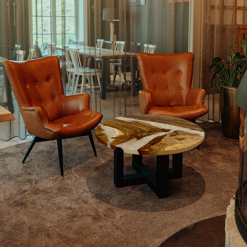 Couchtisch_Epoxidharz. Couchtisch rund mit Epoxidharz elfenbein. Modell Hegauvulkan von schwarzhirsch