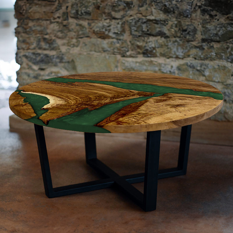 Epoxy Couchtisch. Couchtisch rund mit Epoxidharz smaragd-grün. Modell Hegauvulkan von schwarzhirsch