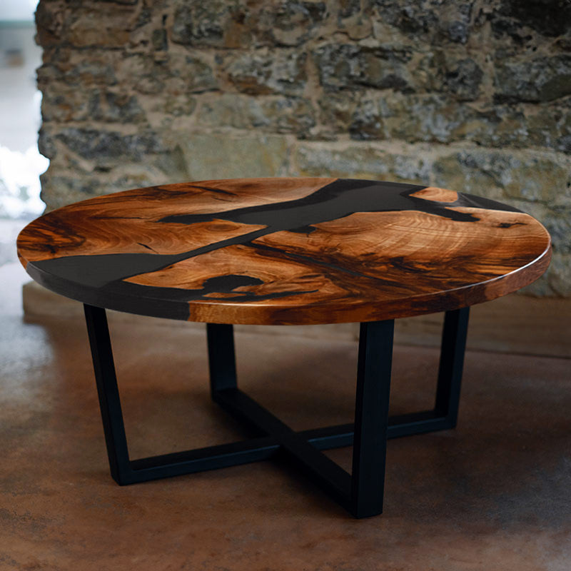 Couchtisch rund aus Nussbaum I Epoxidharz anthrazit. Modell Schluchsee