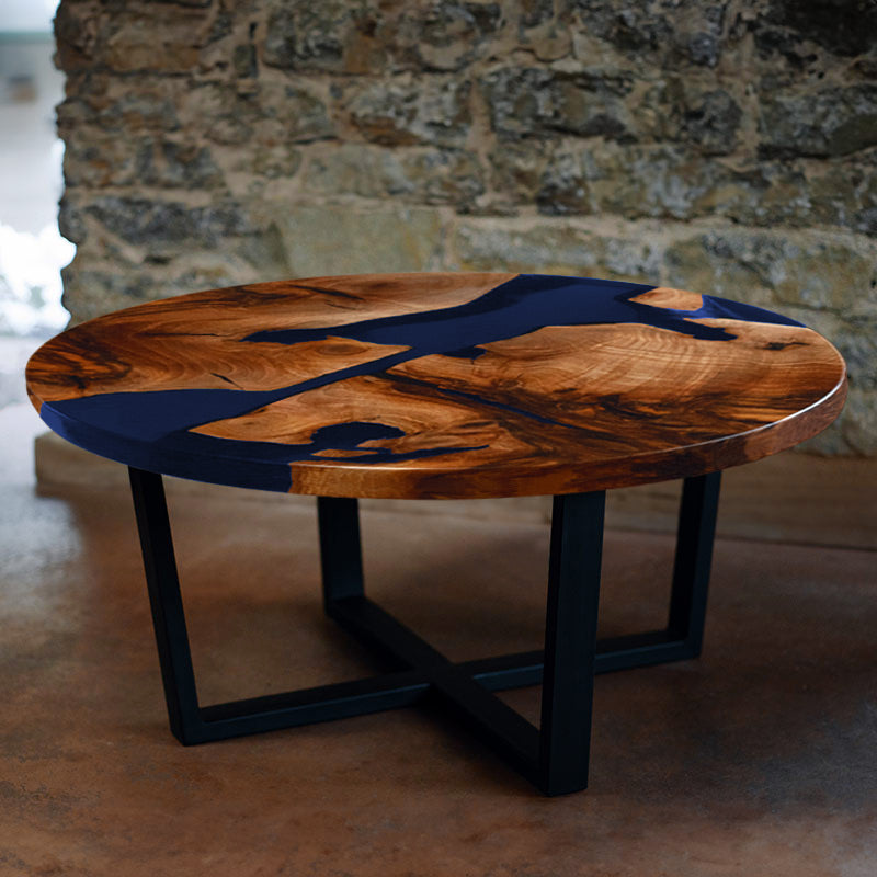Couchtisch rund aus Nussbaum I Epoxidharz blau. Modell Schluchsee