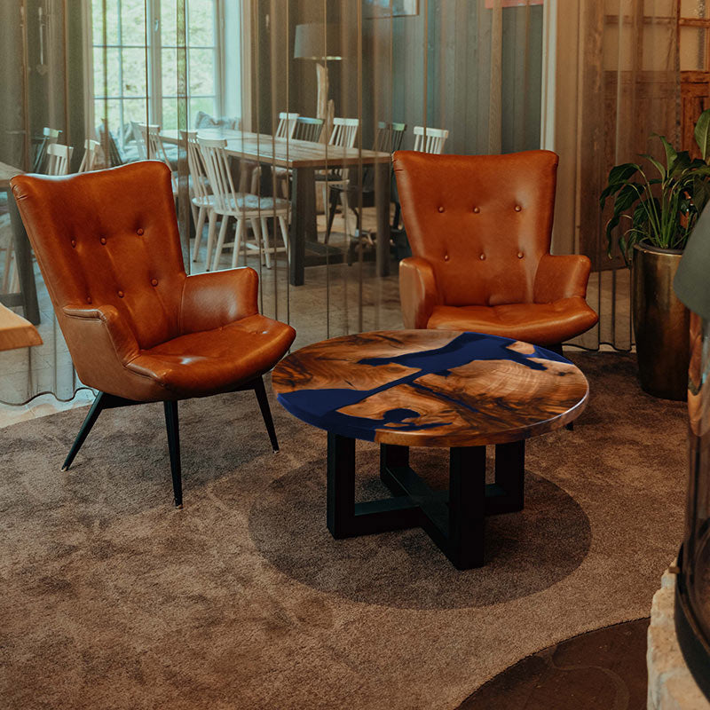 Couchtisch rund aus Nussbaum I Epoxidharz blau. Modell Schluchsee