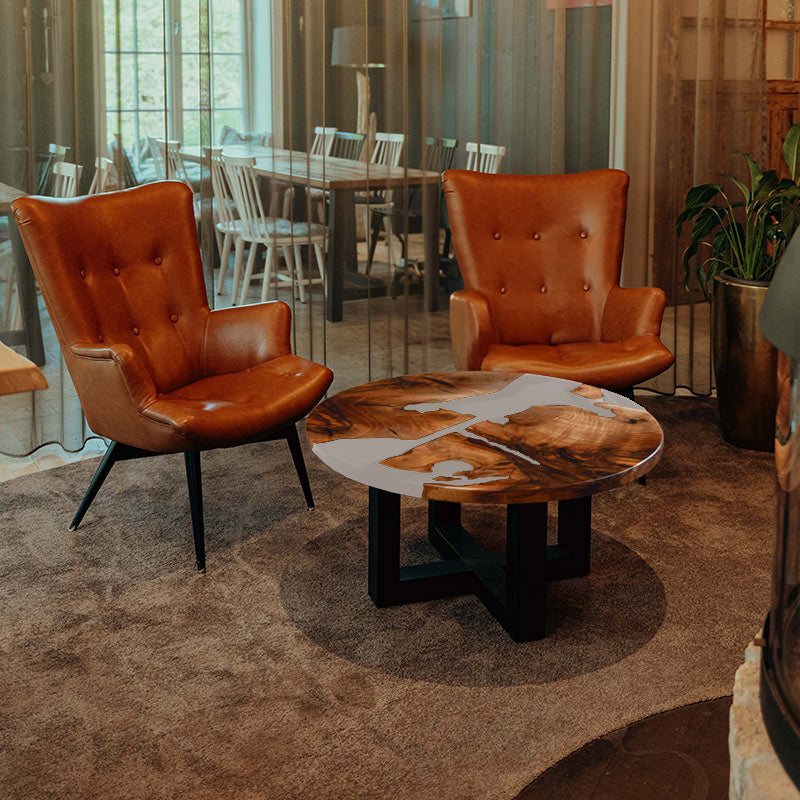 Couchtisch rund aus Nussbaum. Epoxidharz weiss. Modell Schluchsee