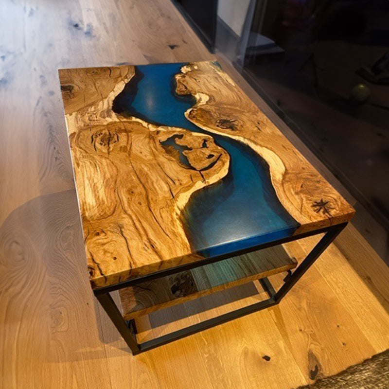 Couchtisch Nussbaum mit Epoxidharz. Modell Bergbach von schwarzhirsch