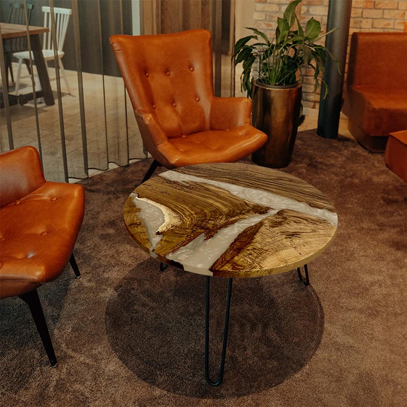 Epoxidharz Couchtisch. Couchtisch rund mit Epoxidharz elfenbein. Modell Hegauvulkan von schwarzhirsch